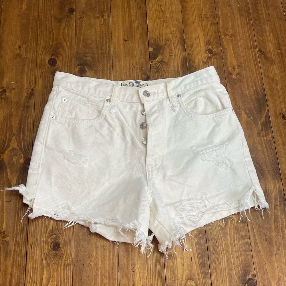 Free people we the free size 27 cream distressed jean shorts